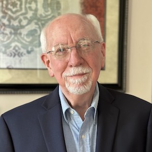 A headshot of emeritus professor Ron Powell